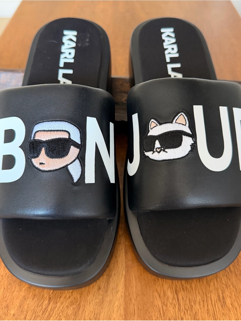 Unisex Karl Lagerfeld Black Slides with White 'BONJOUR' size 8 M. Size 10 W